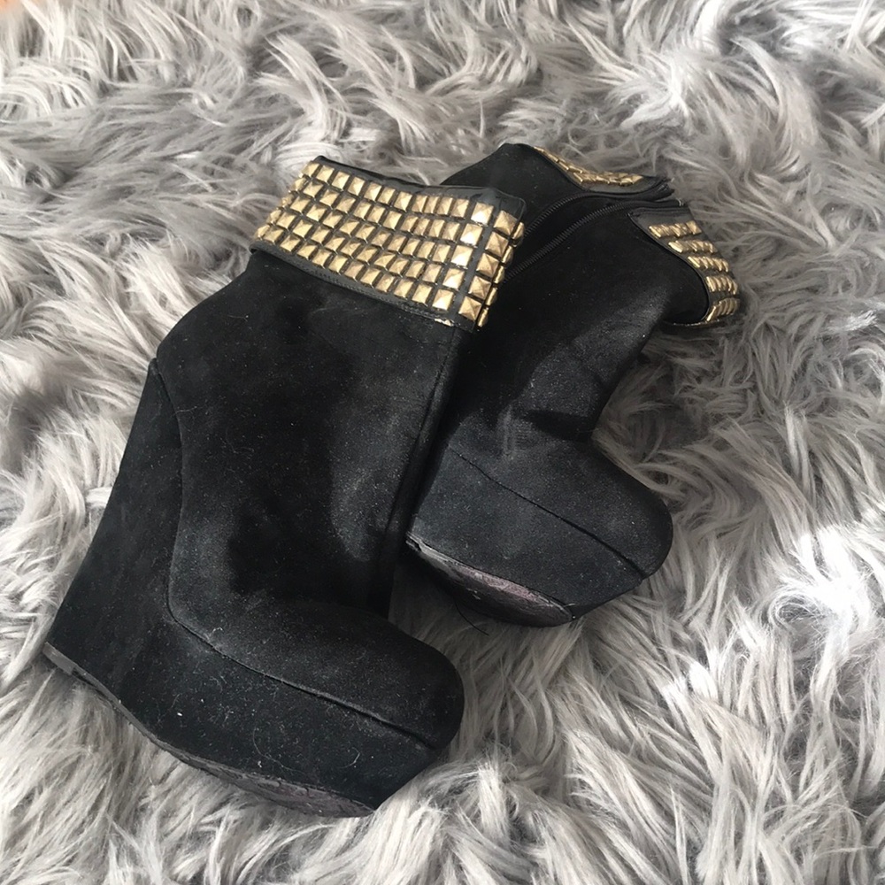 Black suede booties.